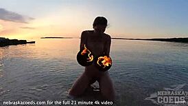 Nude Fire Dancing On The Beach At Sunset