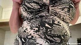 Horny Milf Rubs Her Incredibly Large Boobs with Oil in Solo Masturbation Scene.