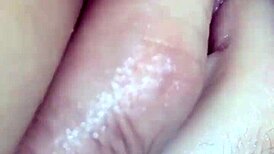 A couple explores squirting insertions on big pussy close-up