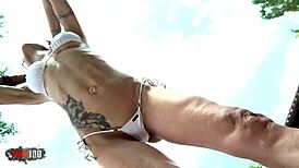 Lyna Cypher strips naked by the pool in athletic milf tease