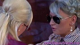 Hey, check out this babe fingering a clothed slut in satin