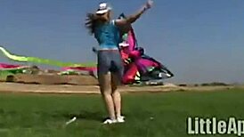 Teen Little April rubs her clit outdoors while sucking a popsicle. She’s all alone showing off.