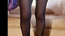 Shiny pantyhose pee in toilet with heels and feet.