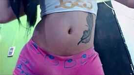 Transsexual Babe Teases in Pink Undies on Webcam