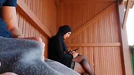 Public cock stroke in front of a shy Arab girl