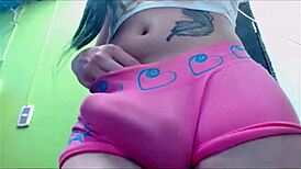 Transsexual Babe Teases in Pink Undies on Webcam