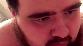 The young gay chub eagerly sucks the dildo before riding it passionately.