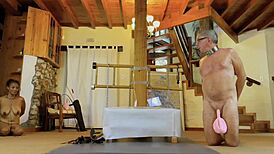 Dominatrix Mistress April Binds Slave Rose in Tight Tubes.