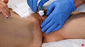 Feeling relaxed during depilation by beautician in latex gloves