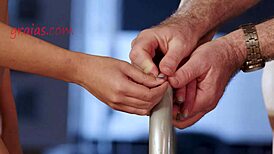 master tries a tough game with two submissives in bdsm play.