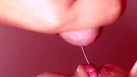 This Japanese wife is cheating with a monster cock in a close-up blowjob scene.