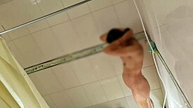 Hidden cam catches cute Argentinian nurse stripping at Monterrey institute.