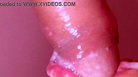 This Japanese wife is cheating with a monster cock in a close-up blowjob scene.