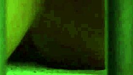 Voyeur watches lesbian slave in bondage. She fingers her big ass and tits, orgasming hard.