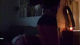 Latina woman teases with her big ass and rips clothes in striptease.