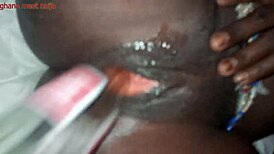 I'm playin with this ebony pussy and fuckin it with a coke cola bottle