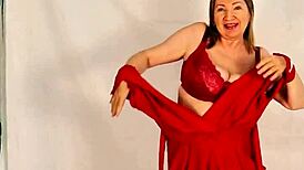 hot granny flaunts huge natural tits while stripping down. closeup reveals tight asshole and wet pussy!