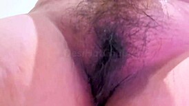 Chubby Indian girl teases with big tits and fingers hairy pussy in shower