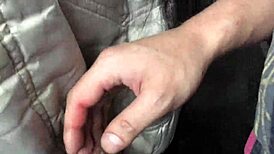 Jacket and boots candidly exposed on the train street scene.