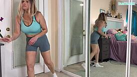 sexy milf tabithaxxx tries on tight gym leggings in bedroom, flashing curvy body and big natural tits for pov fans during sfw haul.