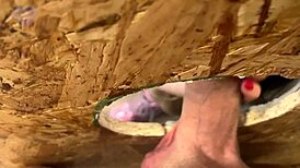 Slut through gloryhole gets cumshots in mouth and pussy