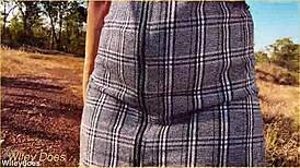 The wife accidentally forgets her panties and flashes her shaved pussy during an upskirt moment in the skirt.