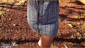 The wife accidentally forgets her panties and flashes her shaved pussy during an upskirt moment in the skirt.