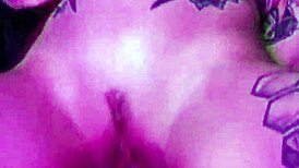 She grips the dildo tightly, clothes ripping as she rides and drips with pleasure.