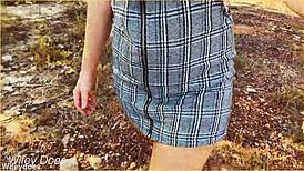 The wife accidentally forgets her panties and flashes her shaved pussy during an upskirt moment in the skirt.