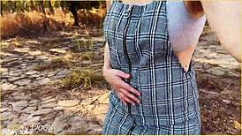 The wife accidentally forgets her panties and flashes her shaved pussy during an upskirt moment in the skirt.