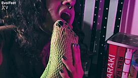 She indulges in foot worship with pantyhose and tattoos