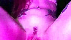 She grips the dildo tightly, clothes ripping as she rides and drips with pleasure.