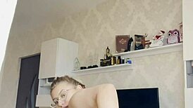 The blonde babe pulls down her panties.