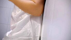 chubby babe, playing with her big tits gets her pussy soaked!