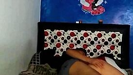 My stepsister lies on my bed showing panties revealing her tempting ass