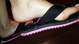 luh gives a footjob with her feet