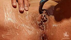 milf in bathroom shaving her wet pussy naked