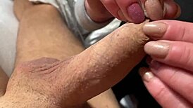 She licks the foreskin and gives handjob