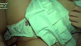 Pretty girl squeezes cock well in the stadium field