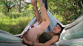 Happy Teen Satisfying Herself In Hammock Outdoors In La Mancha Spain