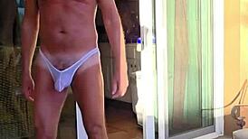 Wow, Papifachero stretches thongs on his balcony during vacation!
