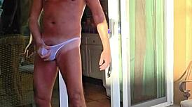 Wow, Papifachero stretches thongs on his balcony during vacation!