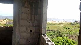 Street boy tricks orange seller into raw building action