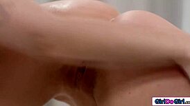 The busty redhead milf says, 'Rub my shaved pussy, petite masseuse'