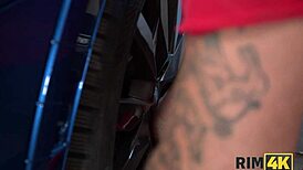 rim4k chick with big boobs licks anus at car shop