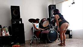 Neighbors Play Drums As She Strips And Shakes Her Huge Ass