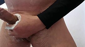 Shaving leads to unexpected cum in this intriguing scene.