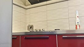 Hot girl cleans the stove, shows her big ass and tits, then masturbates passionately