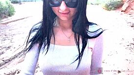 She performs deep blowjob in beautiful canyon with glasses