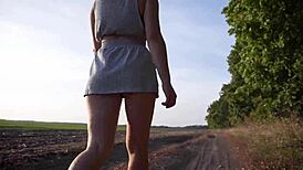 walking outdoors and flashing ass under skirt